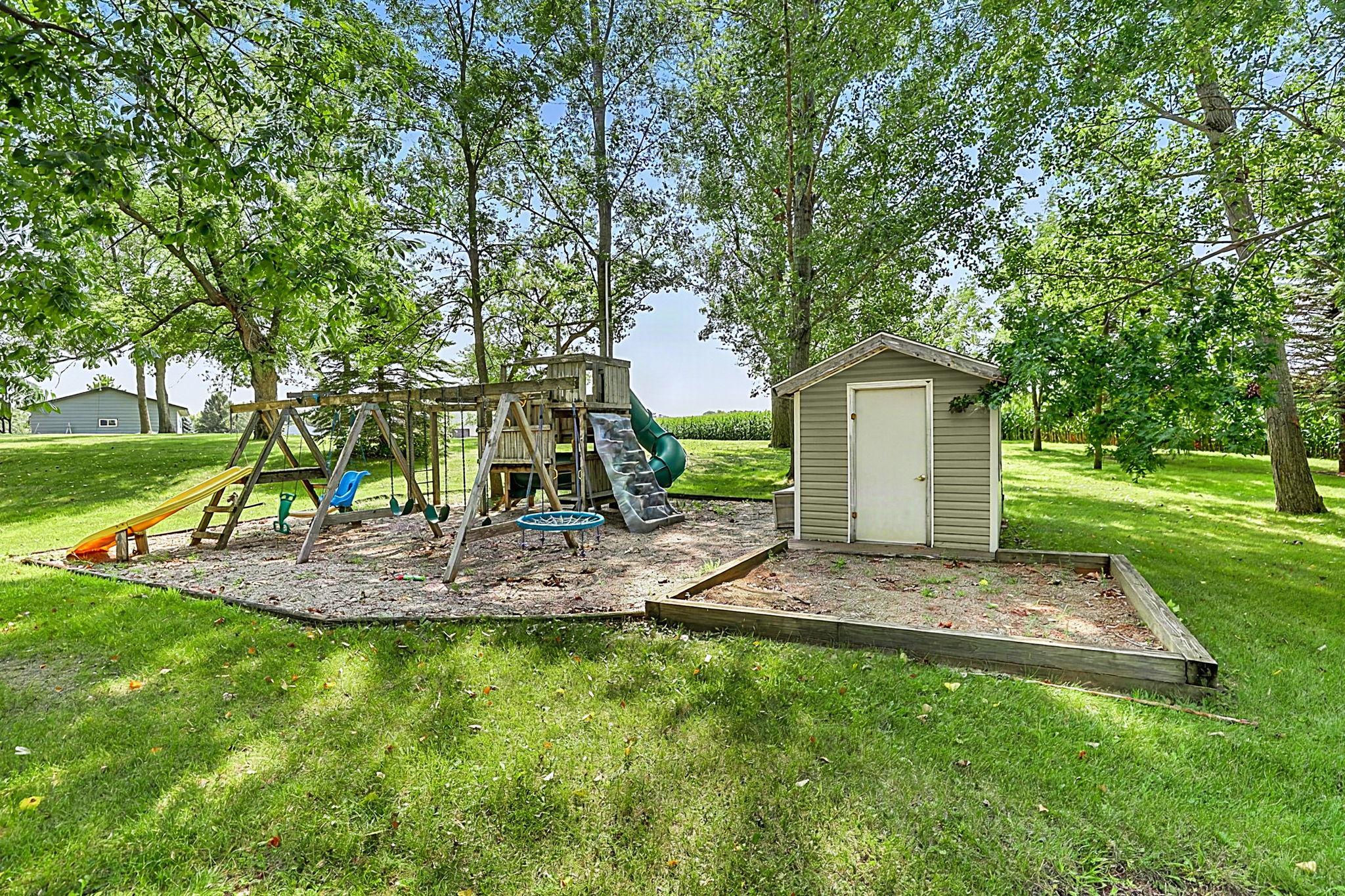 Small garden shed for storing the patio furniture cushions and kids toys!