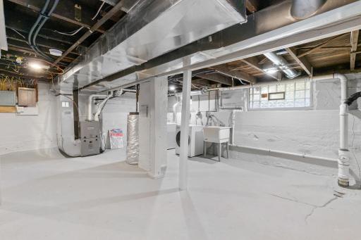 Unfinished lower level awaits your finishing touches.