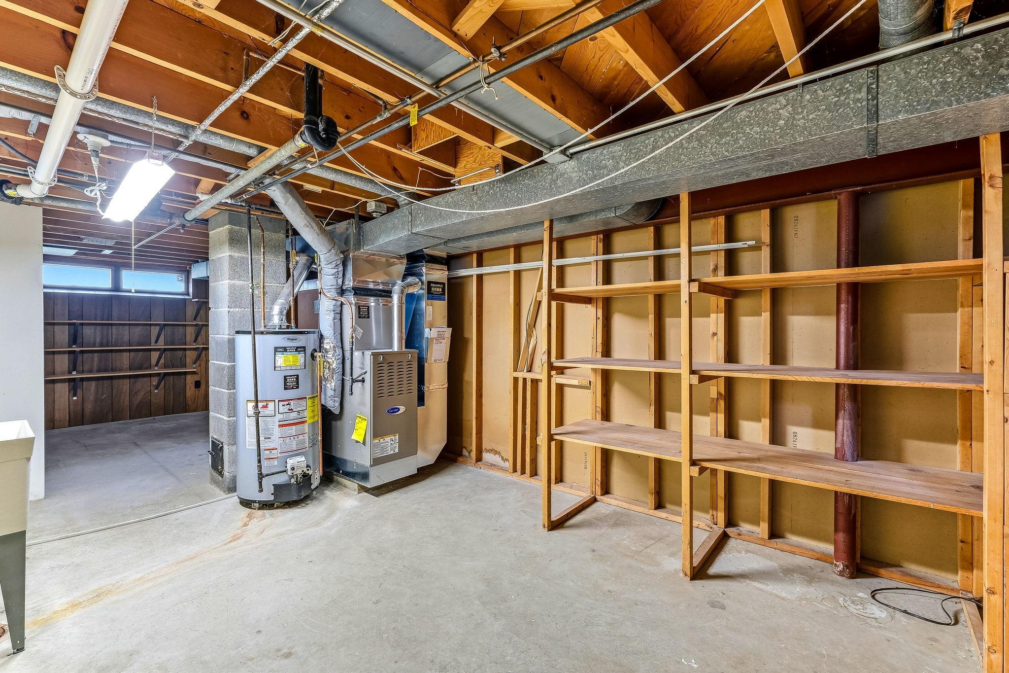 Utility room with bonus storage area