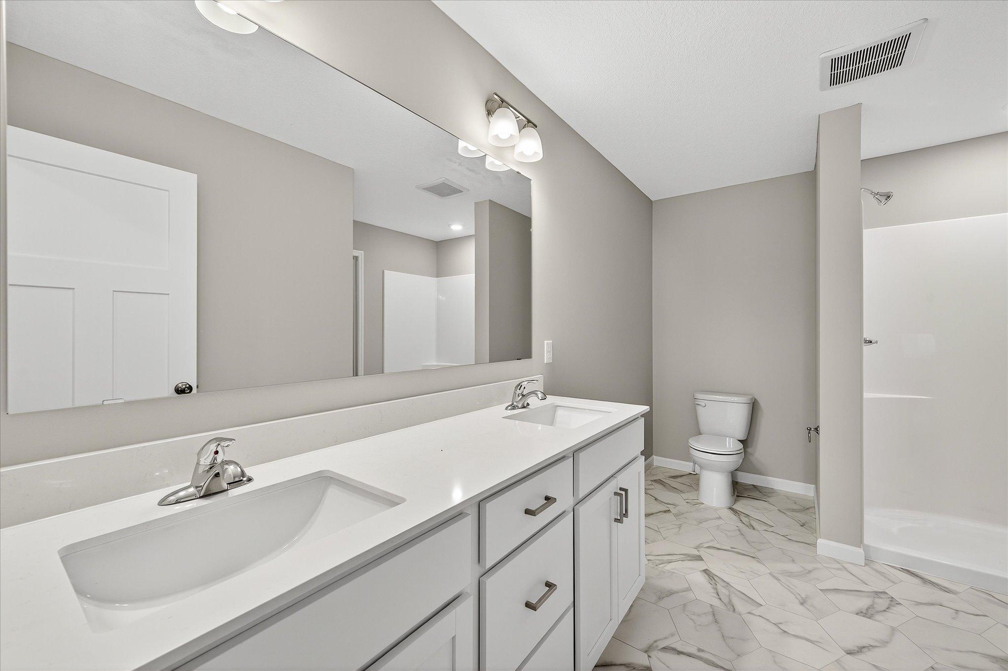 Enjoy the everyday convenience and privacy of an ensuite bath located directly off the primary bedroom.