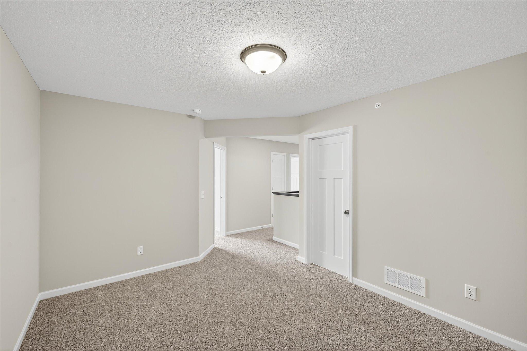 Bedrooms, loft, and laundry are thoughtfully located together upstairs, keeping daily routines simple.