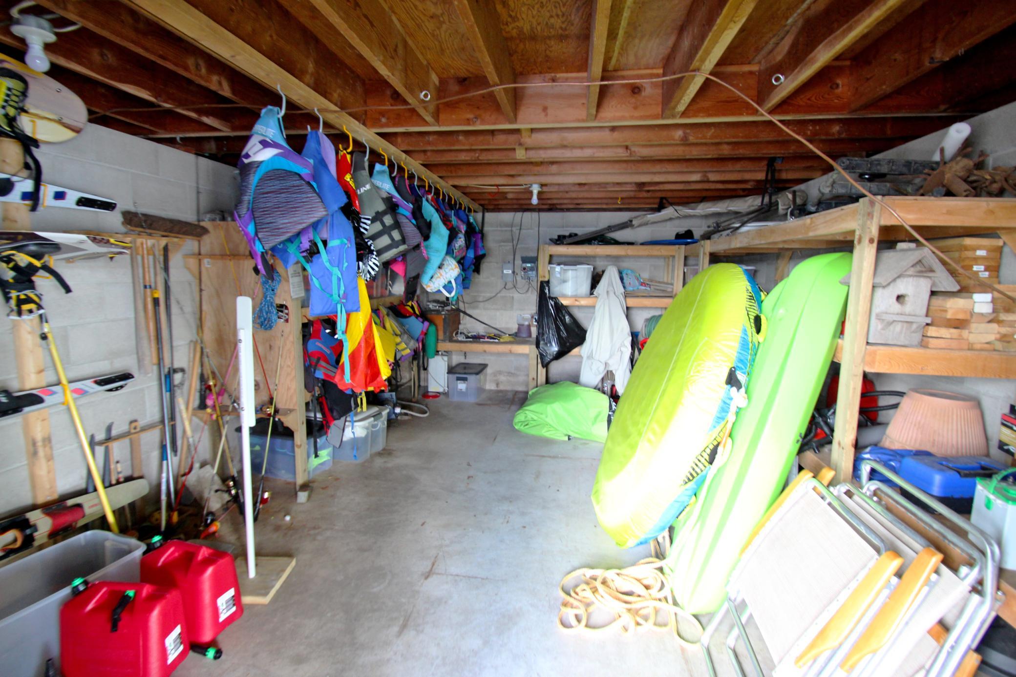 The lakeside boathouse offers tons of storage space for all your lake toys!