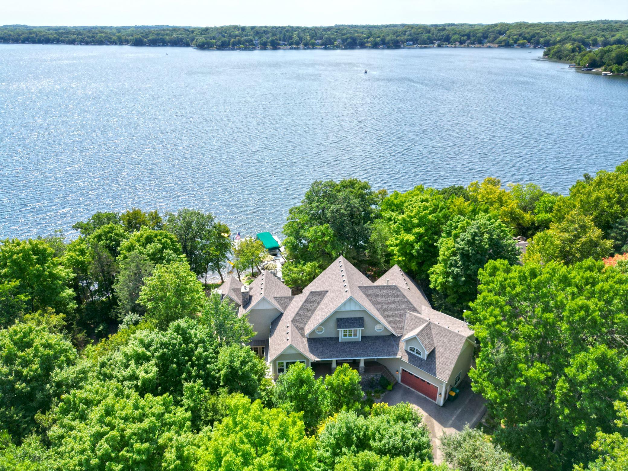 Fun on the water is yours year-round, take-in stunning views from wrap-around decks, docks, beach and the spacious bon-fire area!