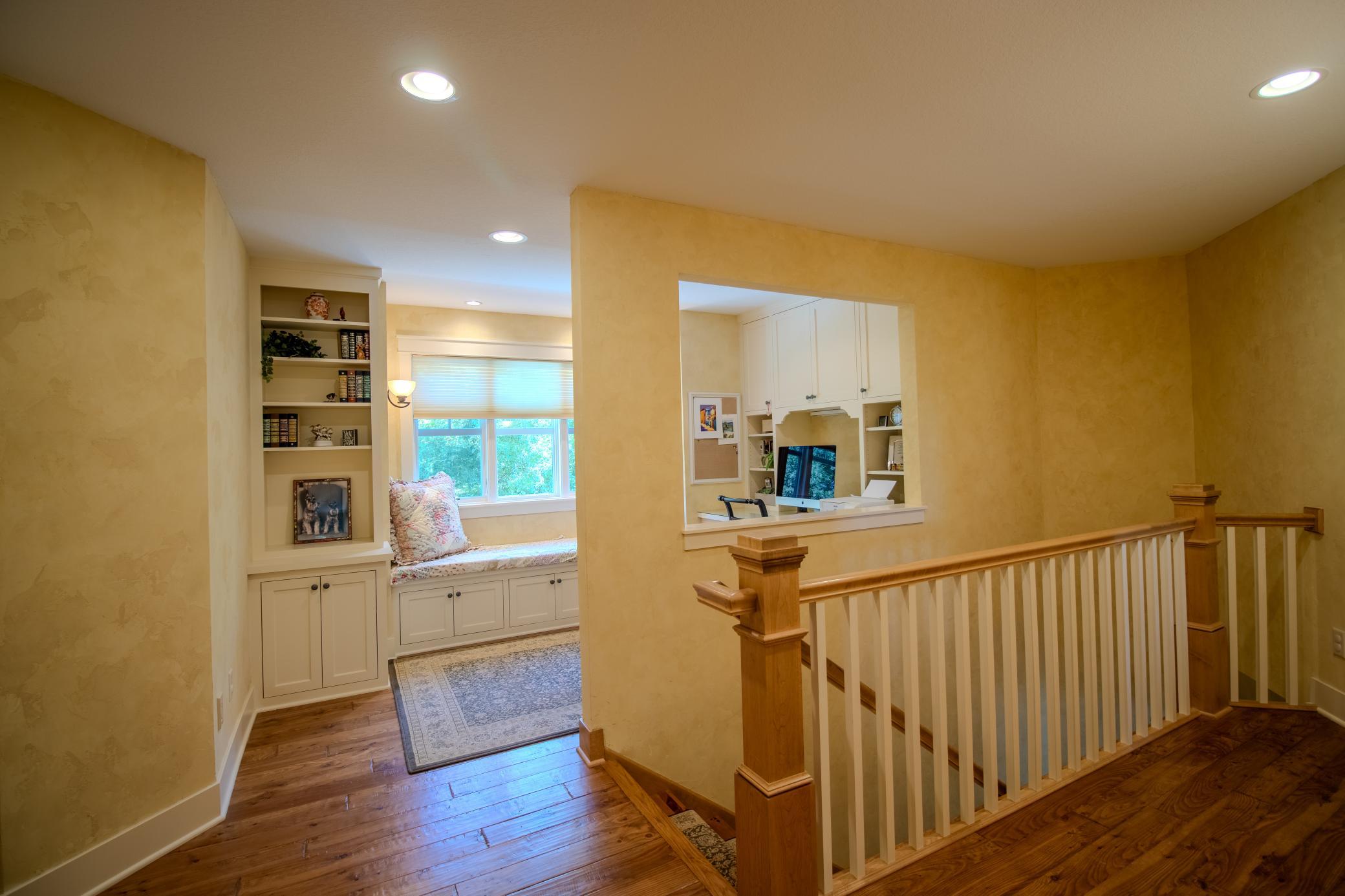The upper level includes an office area, two bedrooms with bathrooms, hall laundry, 3-quarter bathroom and bunk room.