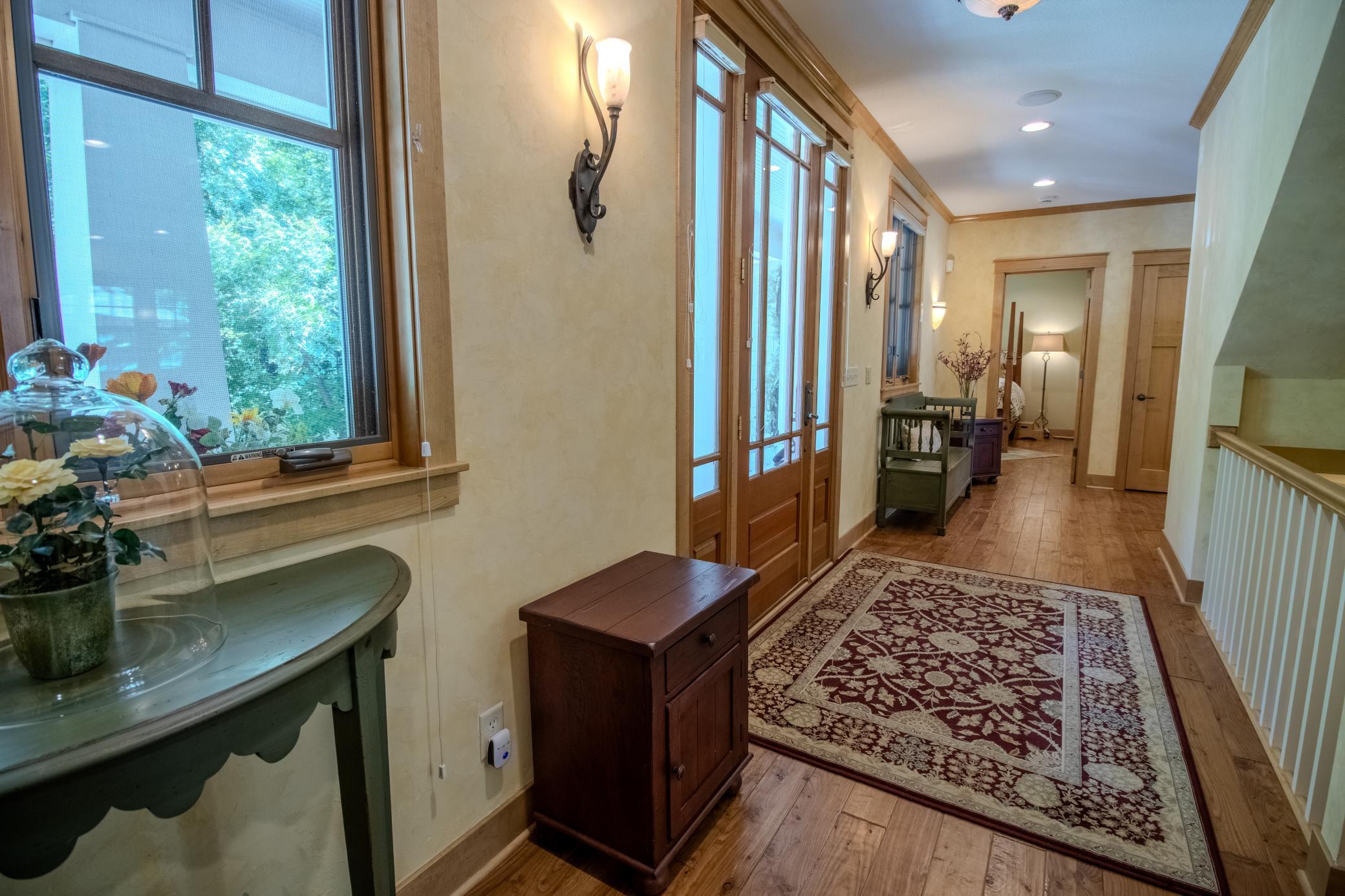 The foyer offers large front entry door, and leads to the kitchen, pantry, laundry/mud room and master suite.