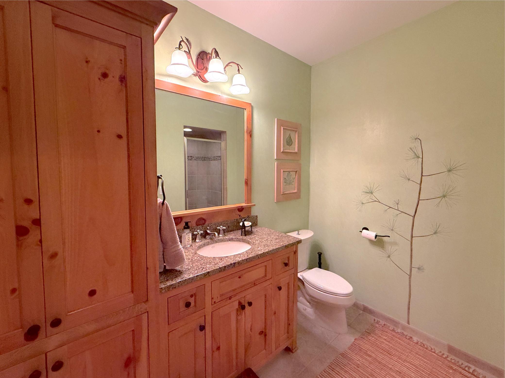 An additional 3-quarter bathroom can be found just off the entertainment room & work-out room.