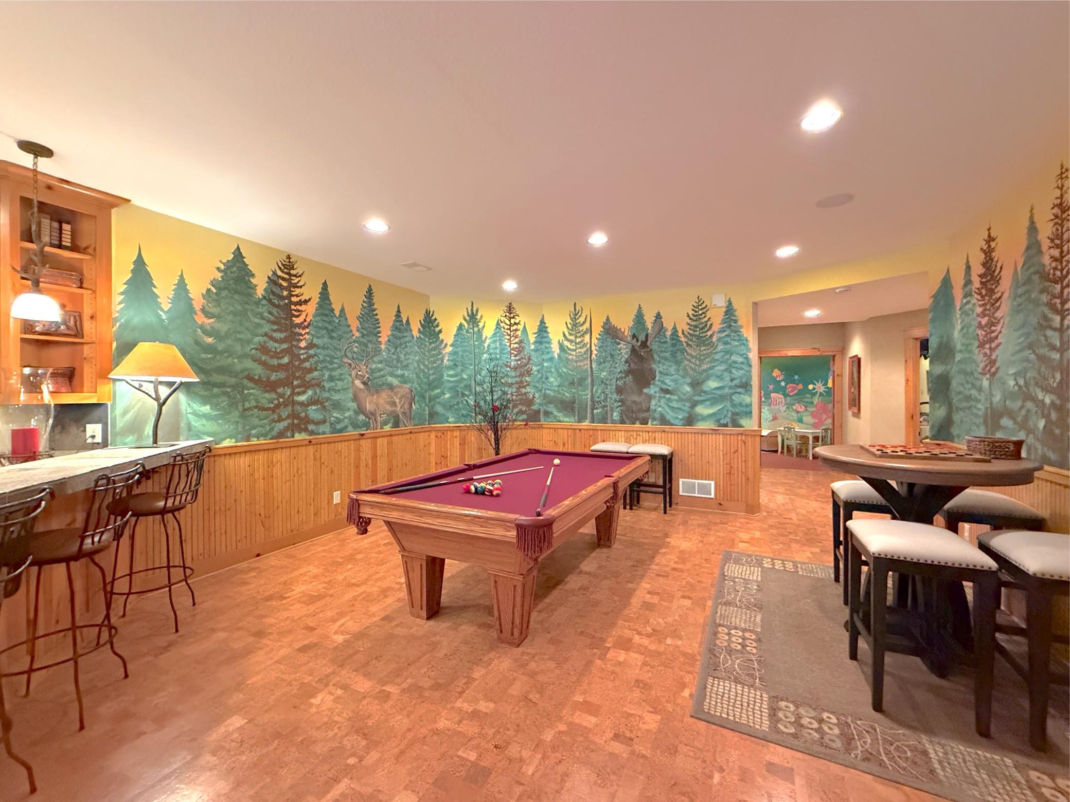 Another view of the room with the pool table - imagine evenings spent entertaining your friends and family after a lake day.