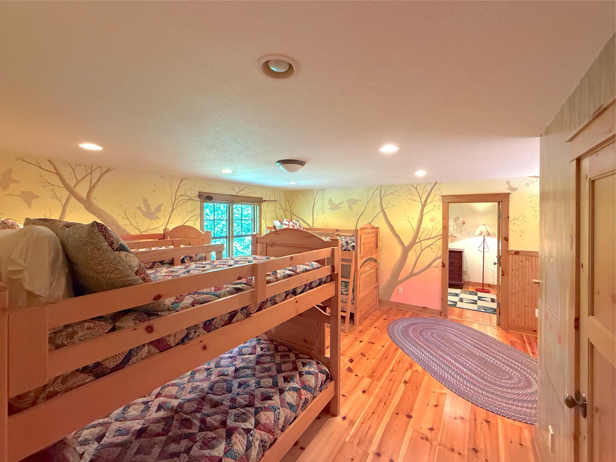 The hand-painted walls continue throughout the bunk-room, this will be the favorite space for the kids to spend their nights.