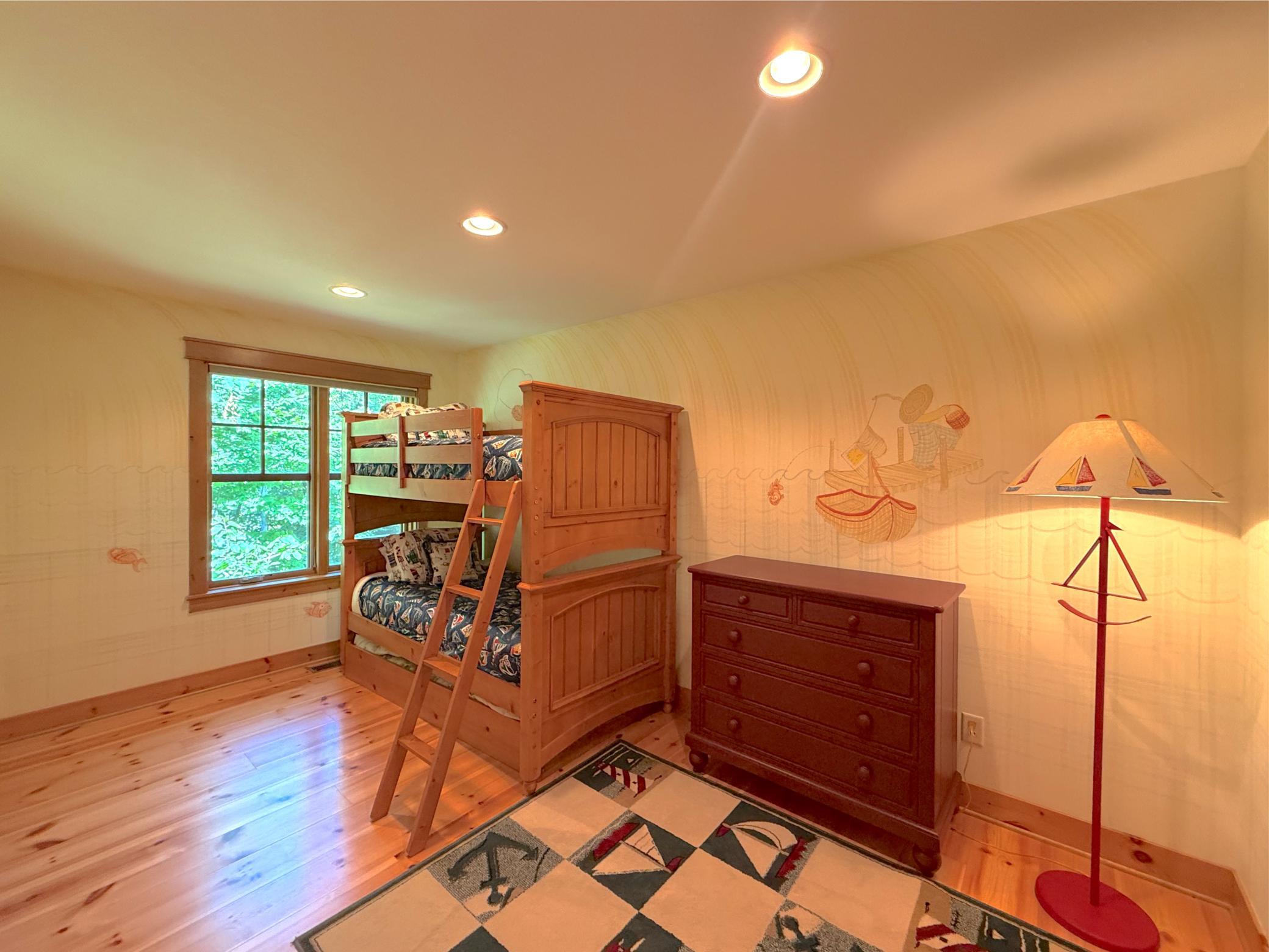 This additional room just off the bunk-room would be perfect for a private nursery finished with a walk-in closet.