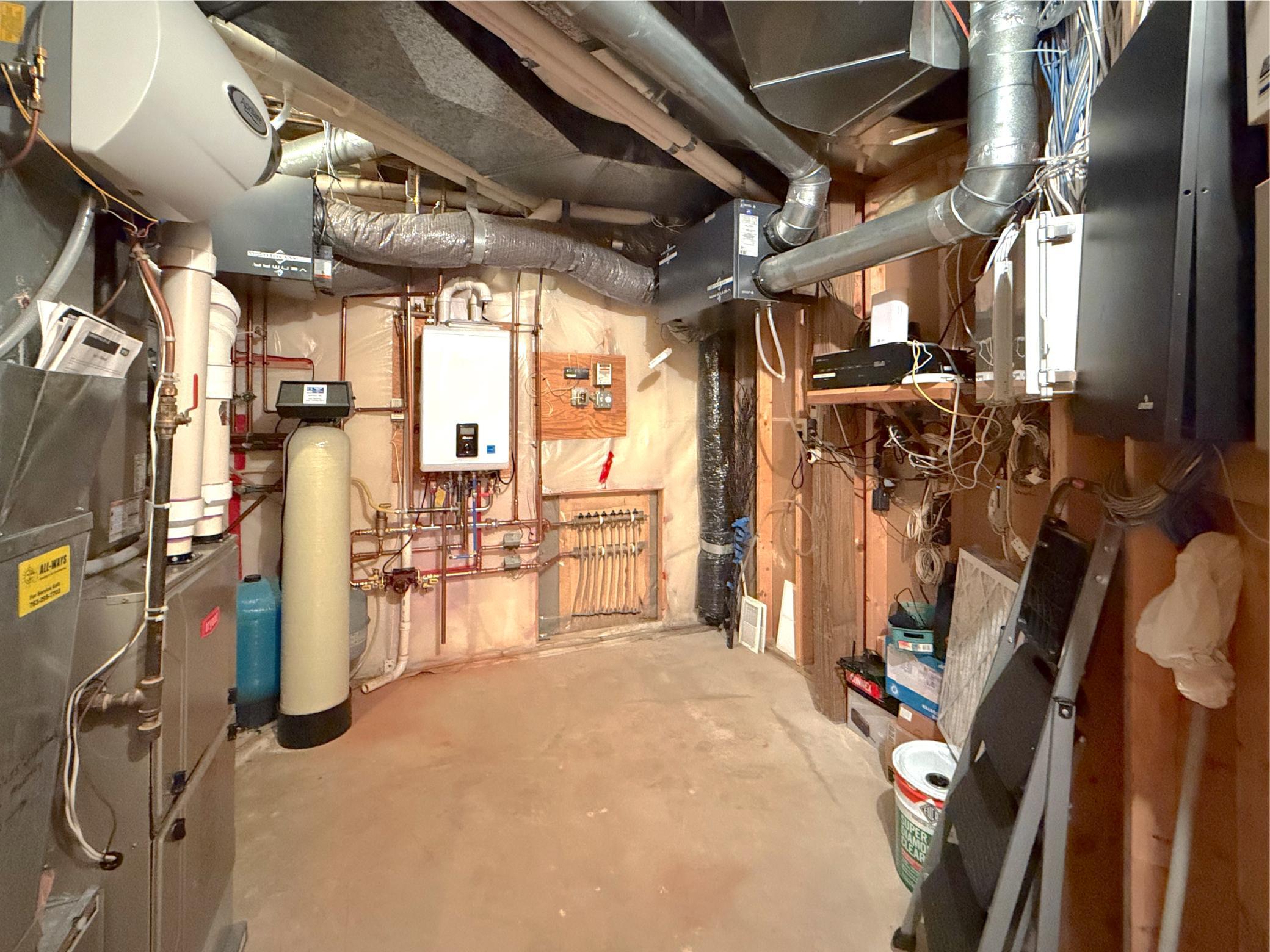 All the mechanicals are tucked away in this room that offers even more space for storage.