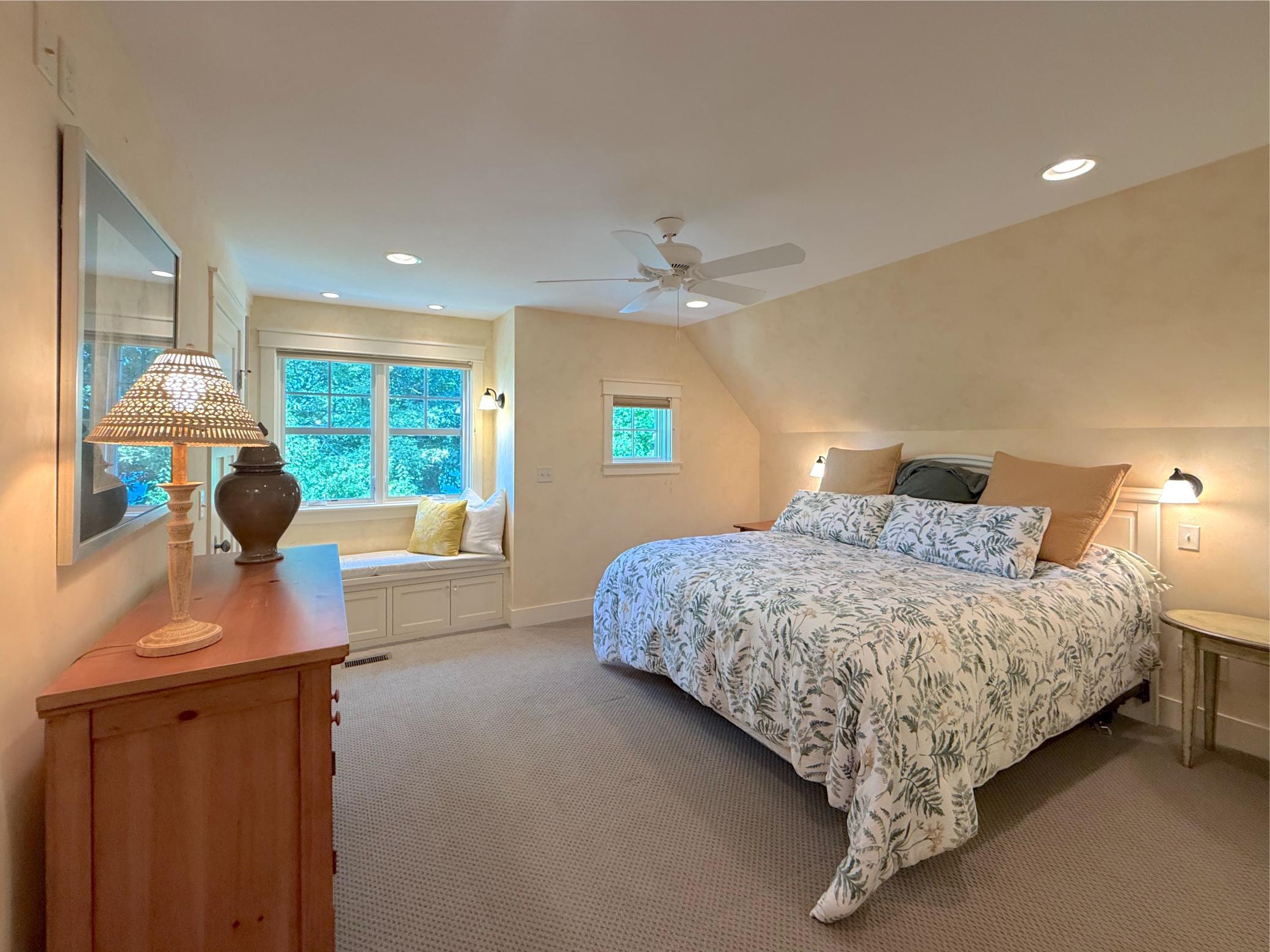 Relax with a window seat offering fantastic Lake Sylvia views in the second suite in the upper level, your guests will be so comfortable.