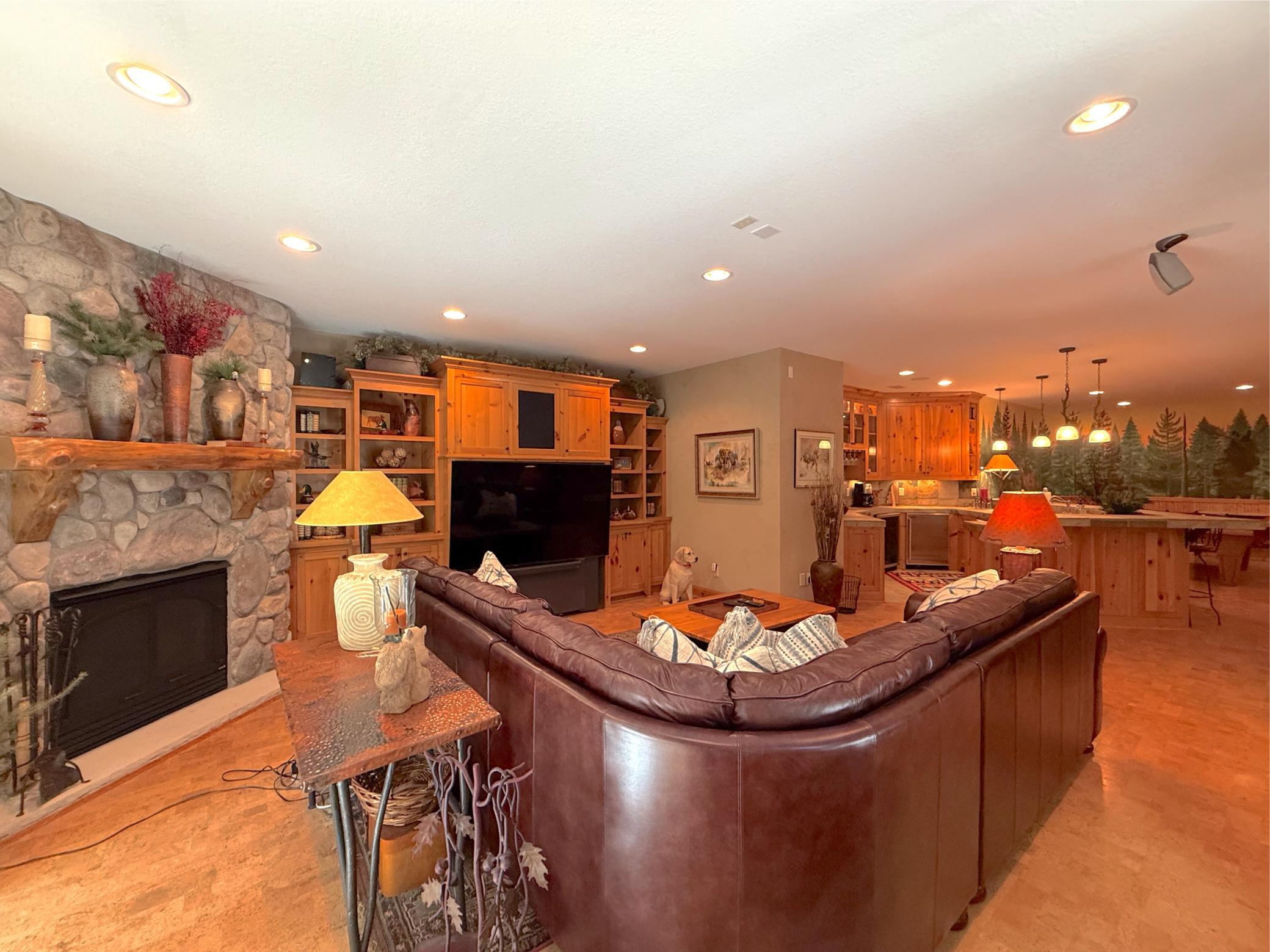 The perfect spot for movie or game night, this space has more than enough space for all your family room furniture.