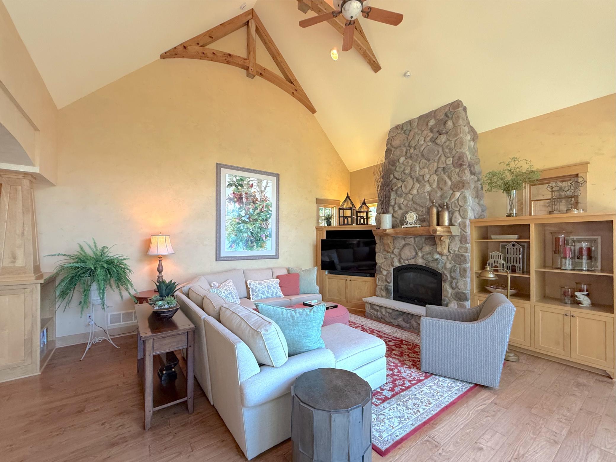 The family room in complete with a built-in cabinet for your television and tons of space for your living room furniture.