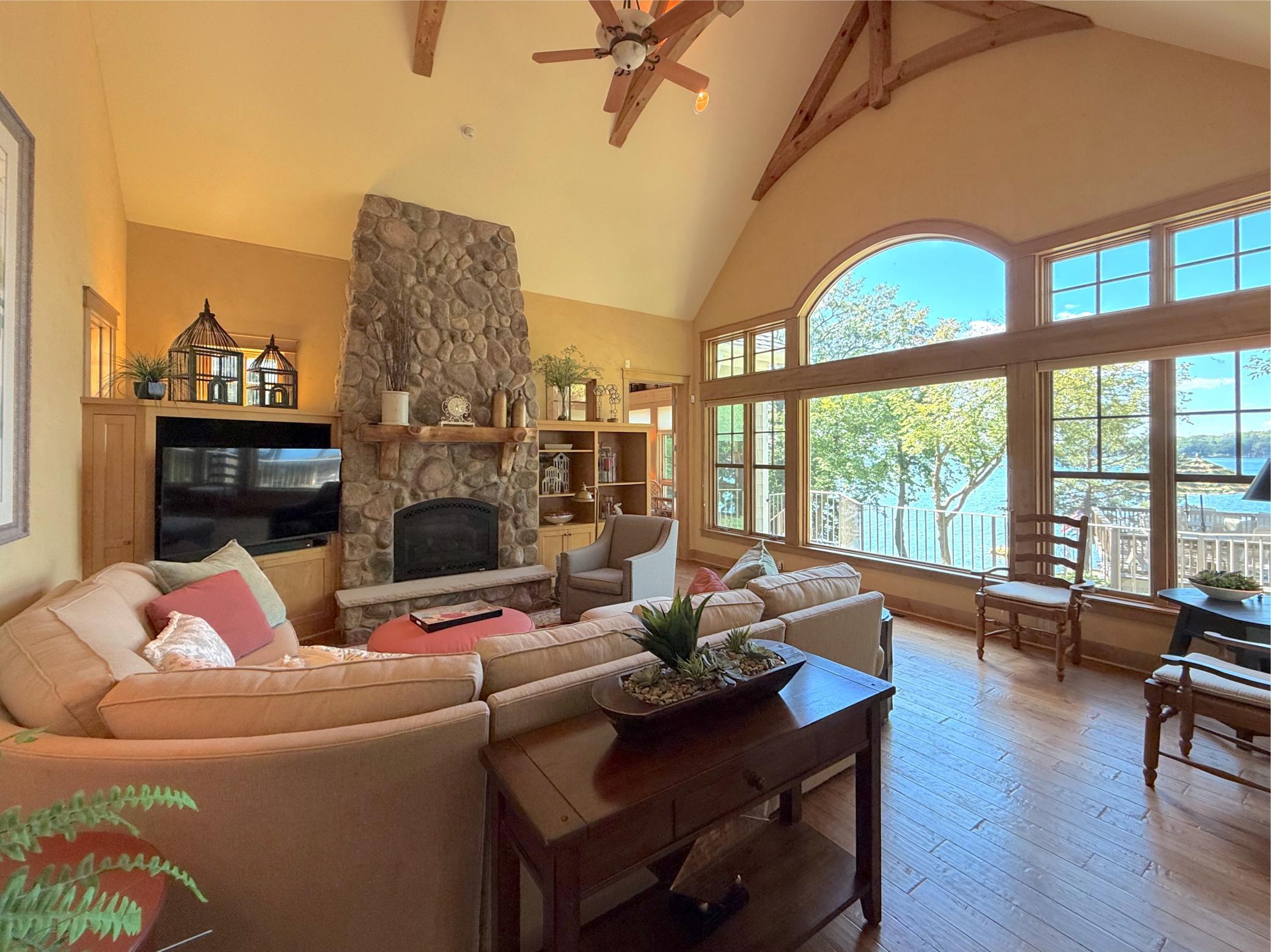 Cuddle up to the fireplace during those chilly winter days, finished off with rock accents and large custom mantel.