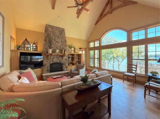 Cuddle up to the fireplace during those chilly winter days, finished off with rock accents and large custom mantel.