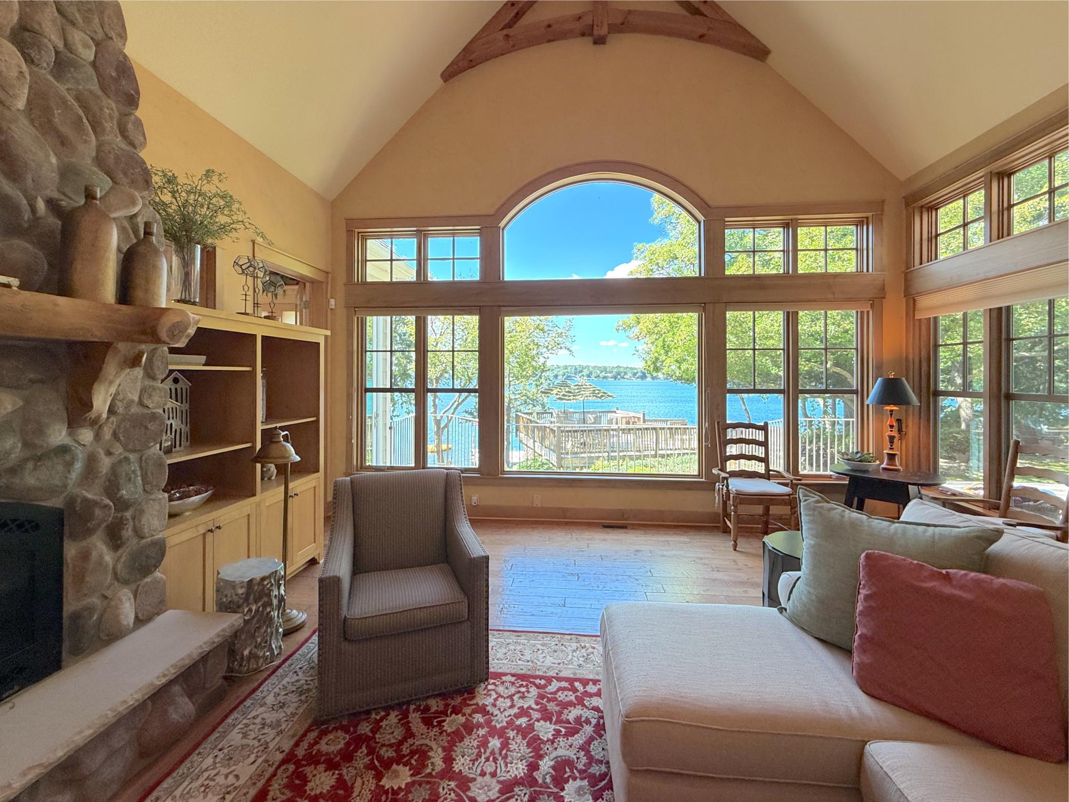 The vaulted ceilings and wood detail showcase the Lake Sylvia view with fantastic finishes and offers wonderful natural light.