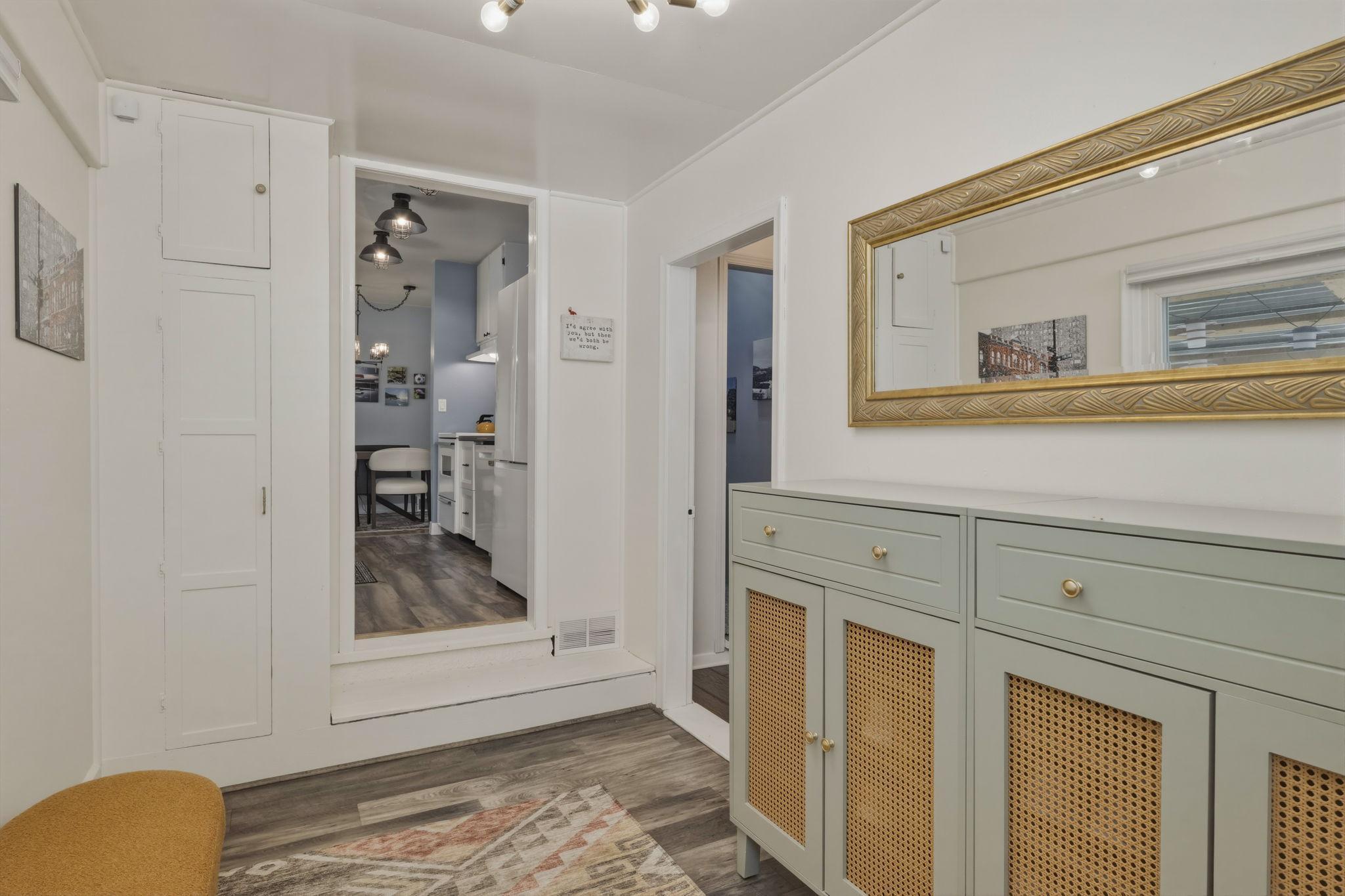 Must-have Mudroom! The step to the kitchen doubles as shoe storage!