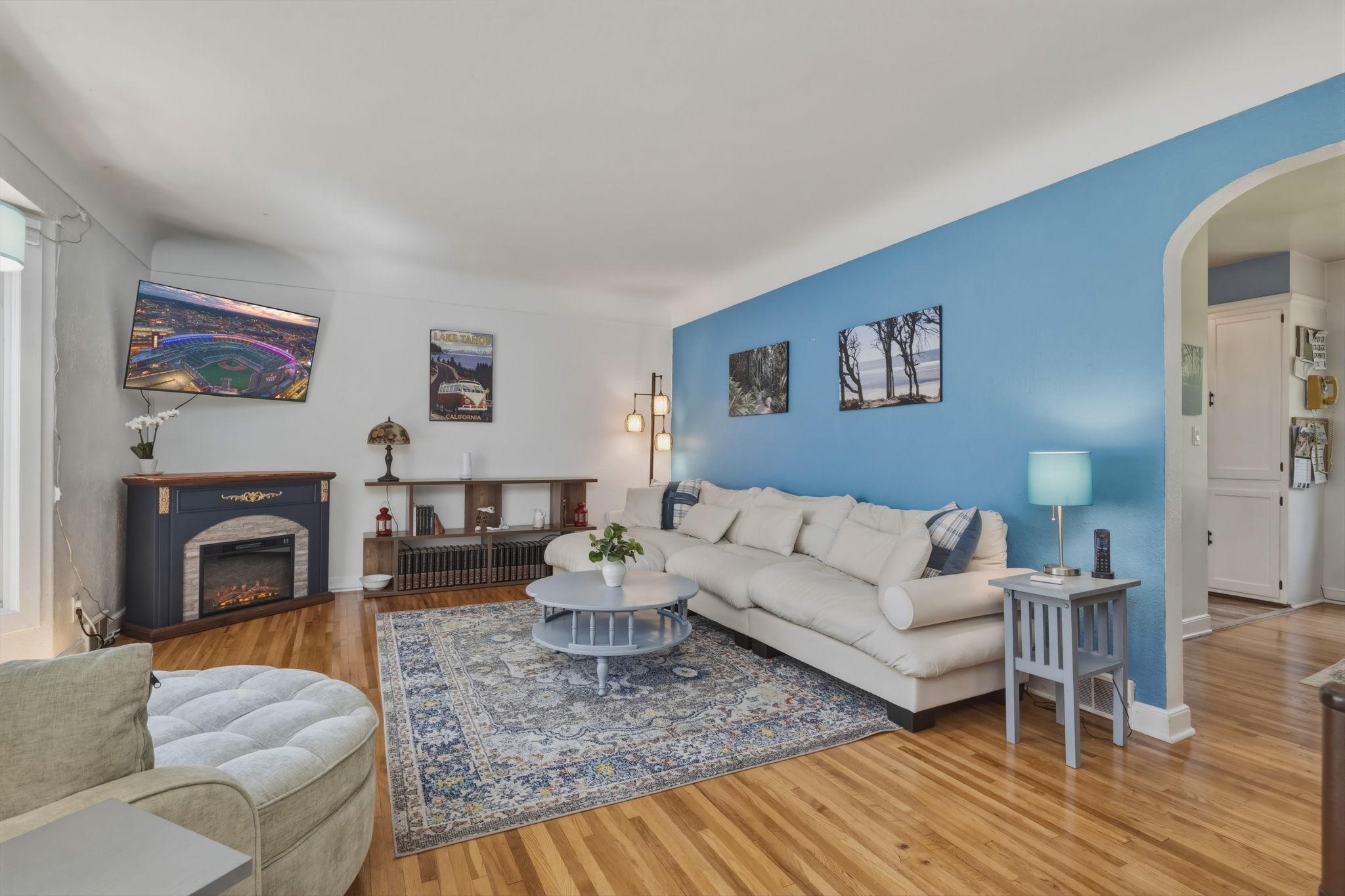 Original hardwood floors help show off the living room!