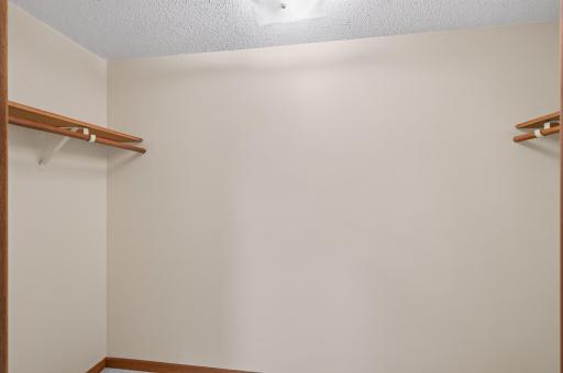 Walk-in closet for 3rd bedroom on lower level.