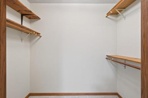 Primary bedroom walk-in closet.