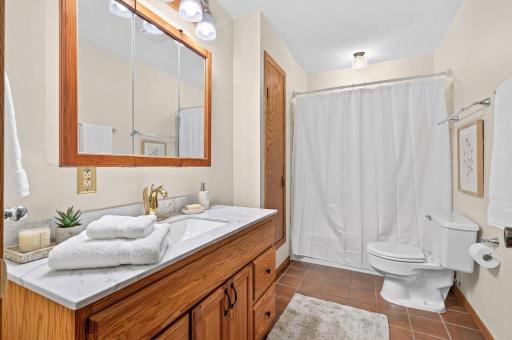 Virtually staged main floor bathroom.