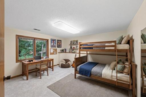 lower level bedroom 1 staged.jpg