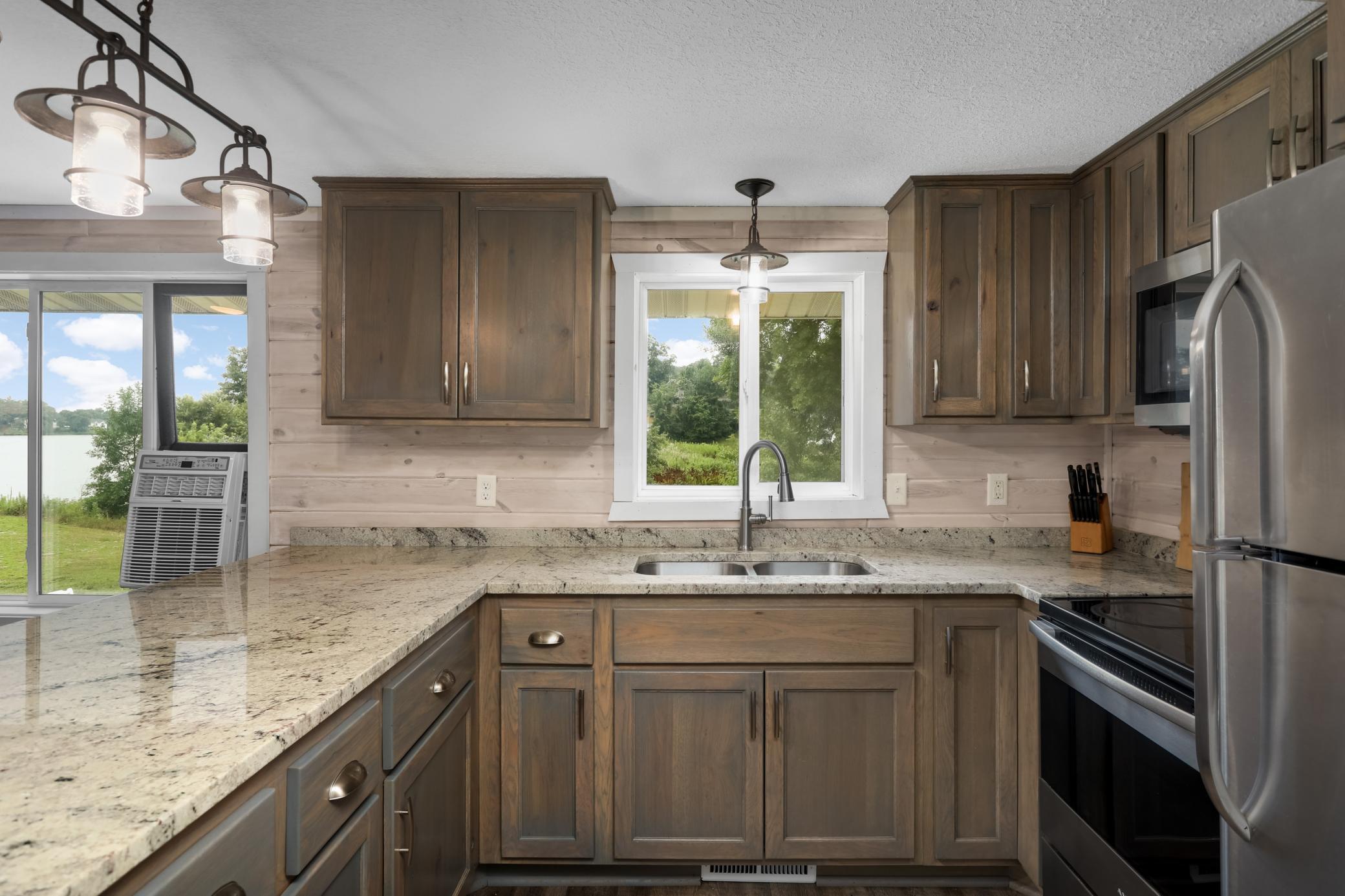 Nice storage and brushed nickel hardware with picturesque views out window!