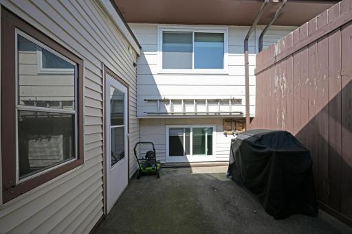 Patio area, screen door is to the enclosed porch