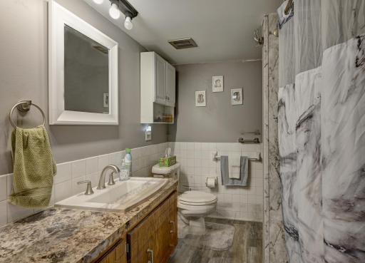 Beautifully updated 3/4 bath in lower level