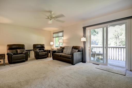 New sliding glass doors leading to the deck and outdoor space