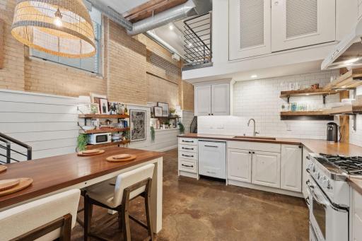 Exposed brick complemented by shiplap walls