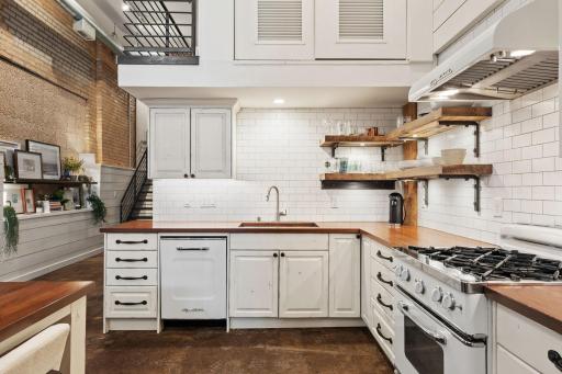 Custom wood accent wall with integrated shelving