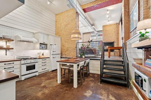 Inviting eat-in kitchen featuring generous prep space