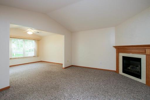 Vaulted ceilings in living room and sunroom make these areas feel even larger than they already are!
