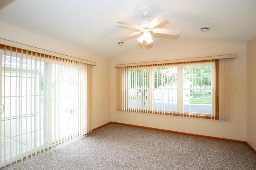 The sunroom at the front of the townhouse brings in lots of natural light and gives a peaceful spot to relax