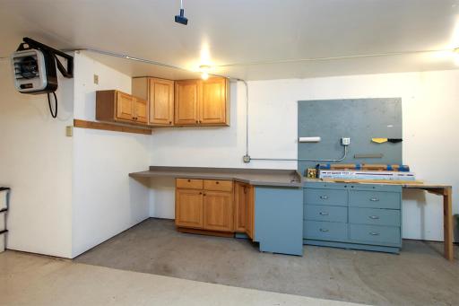 There are also many cabinets and a workshop area for all your projects!