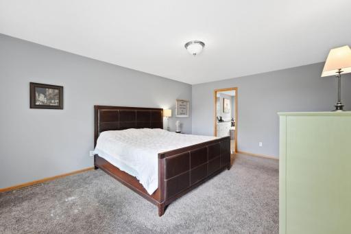 Featuring a private bathroom with a separate tub and shower.