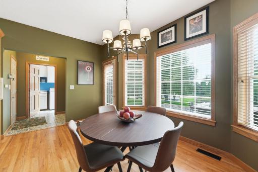 Thoughtfully positioned dining space offers an easy connection to the surrounding living areas.