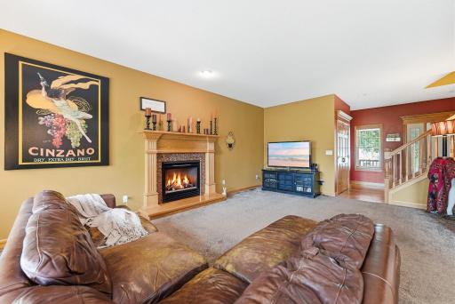 The fireplace adds warmth, character, and charm to the living space.