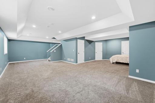 The finished lower level adds valuable living space and flexibility to the home's floor plan.