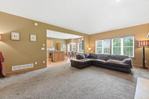 Generous room proportions offer flexibility for furniture arrangements and entertaining.