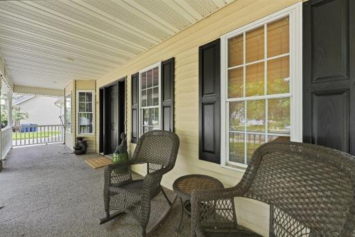 Covered front porch shelters you from outdoor elements.
