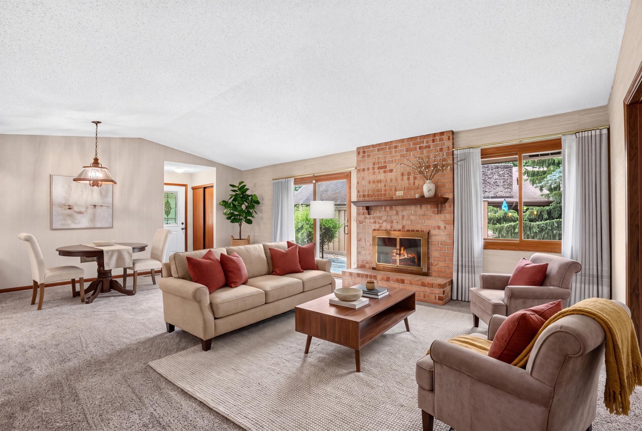 As you enter from the front door you are welcomed into the Living Room Space with fireplace (virtually staged)