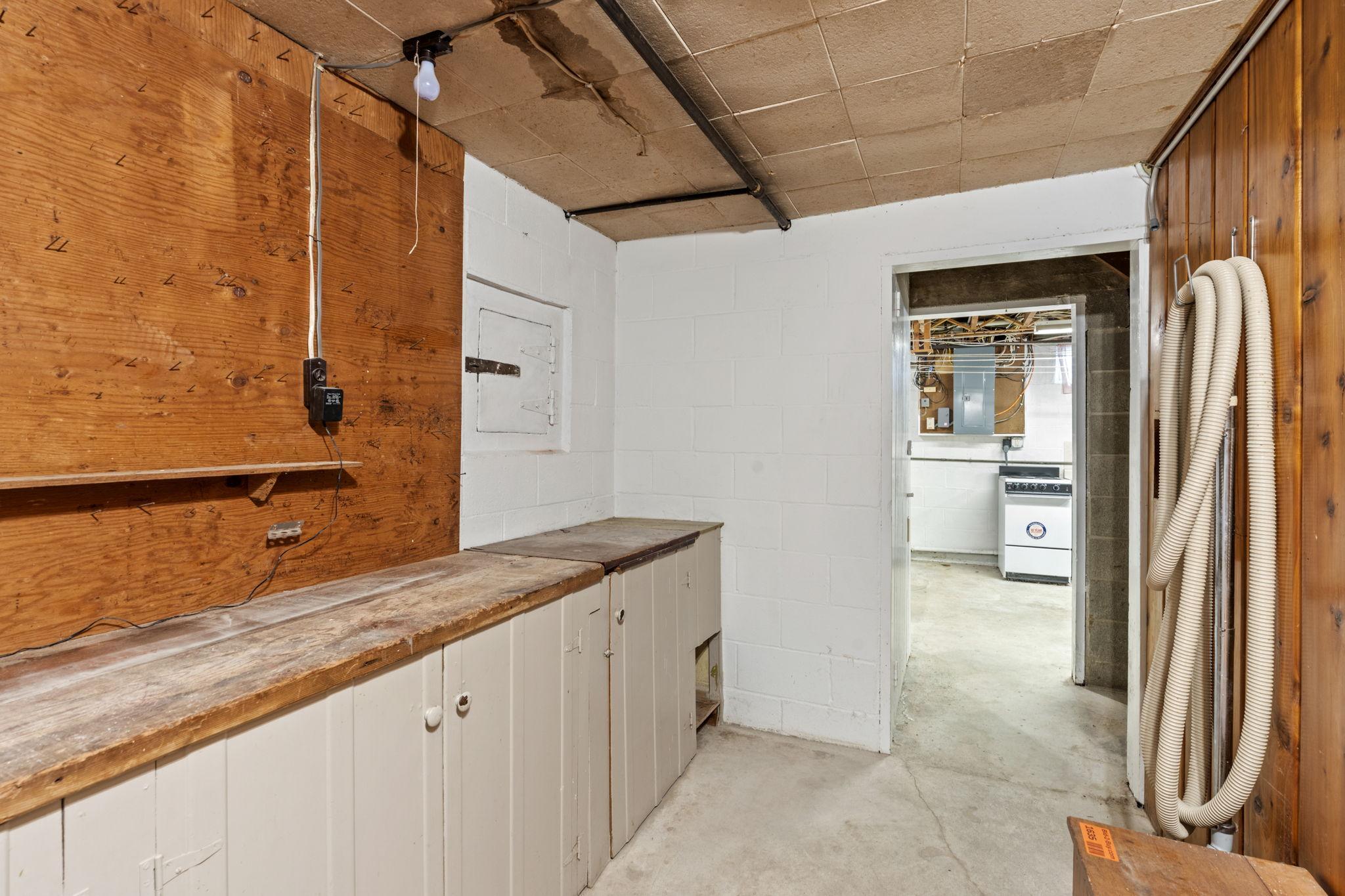 workshop area with concrete hidden vault