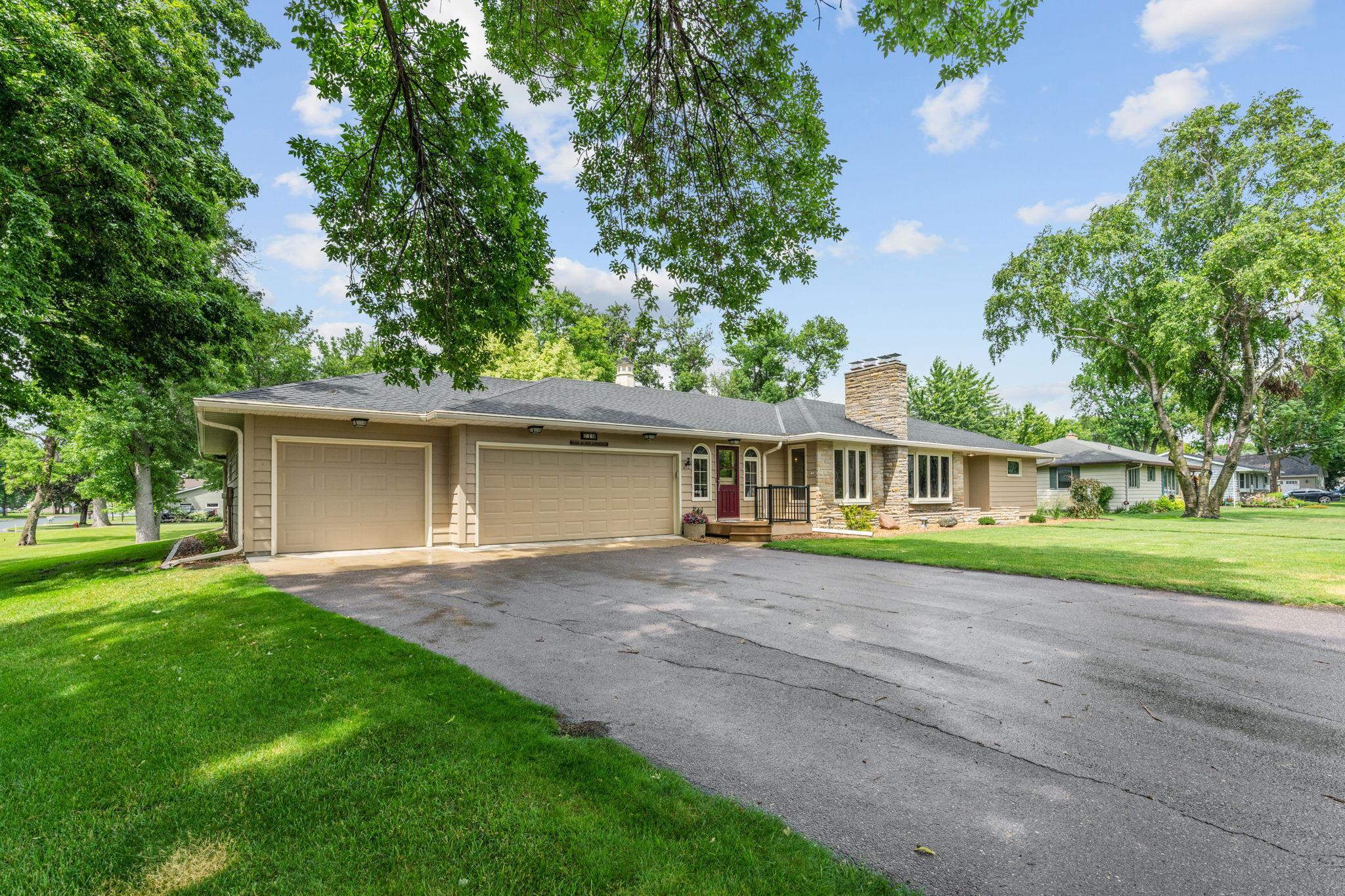 3 car garage in front, 1 car garage in back