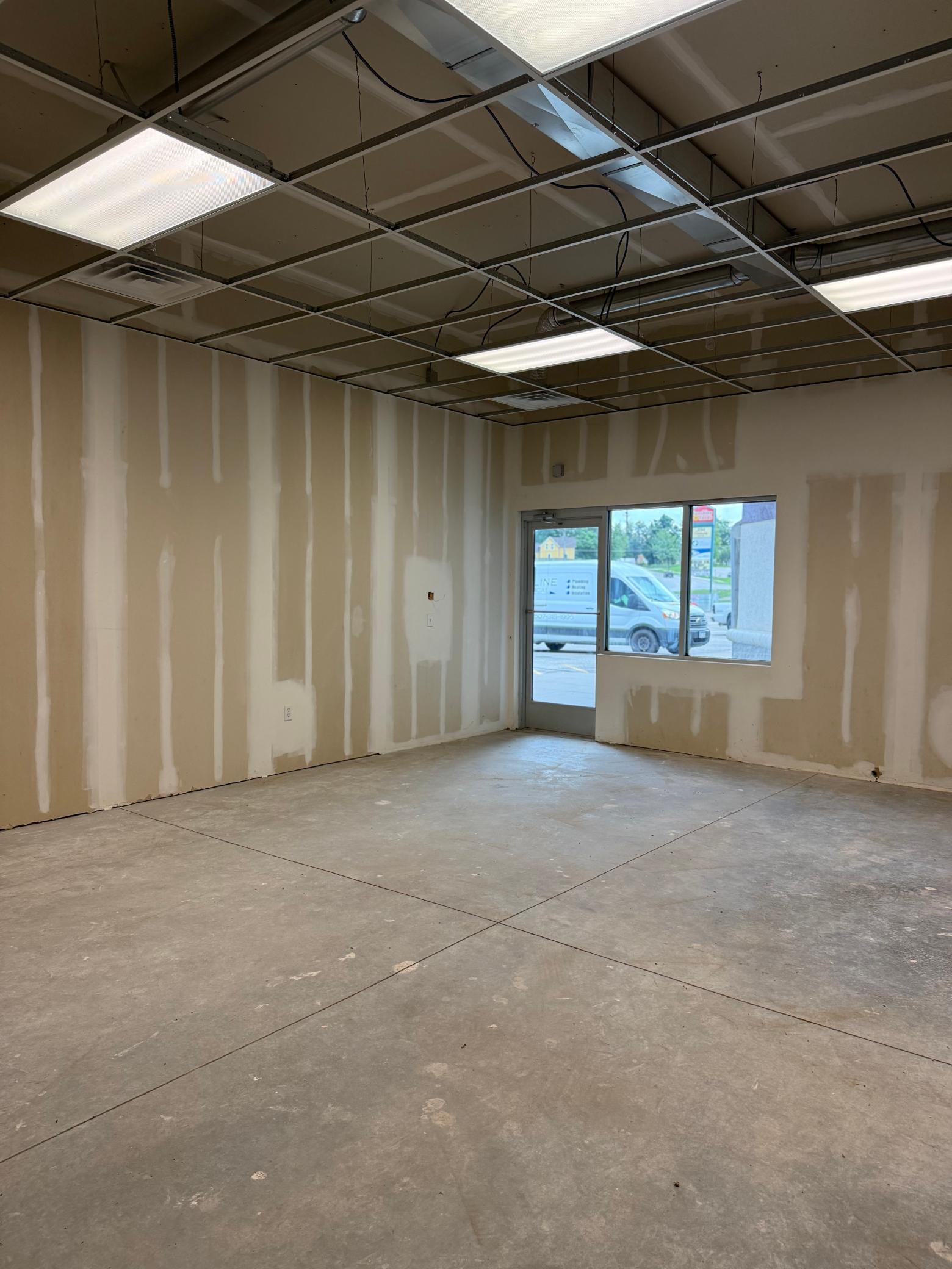 Lease Space C: Largest space at the rear of the building. Would be great for fitness center, health club, larger salon, restaurant.