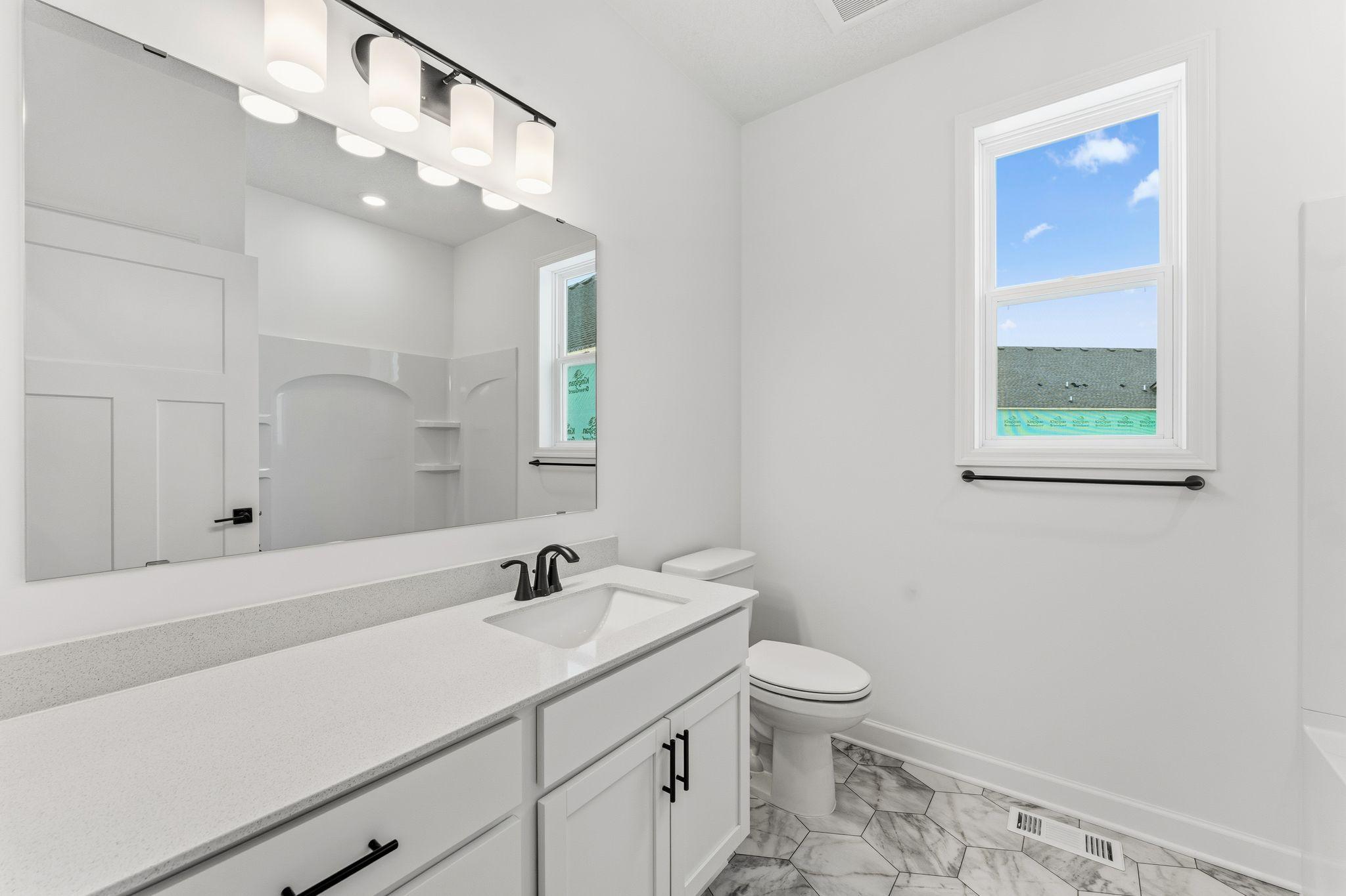 (Photo of a similar home, actual finishes may vary)