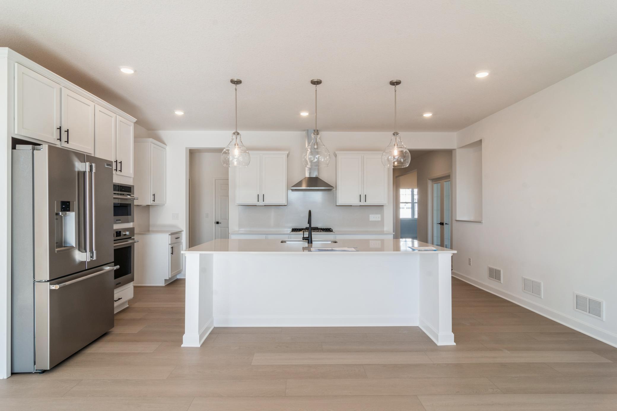 (Photo of a similar home, actual finishes may vary)