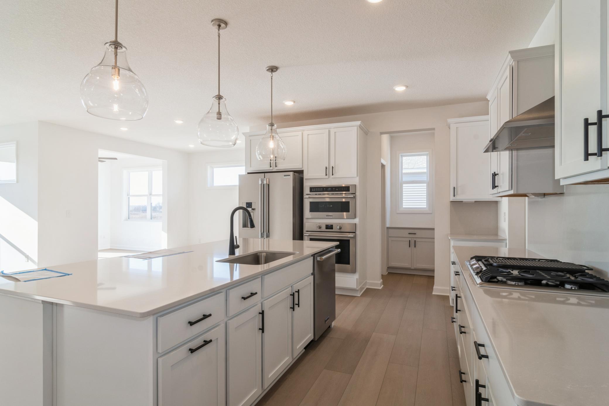 (Photo of a similar home, actual finishes may vary)