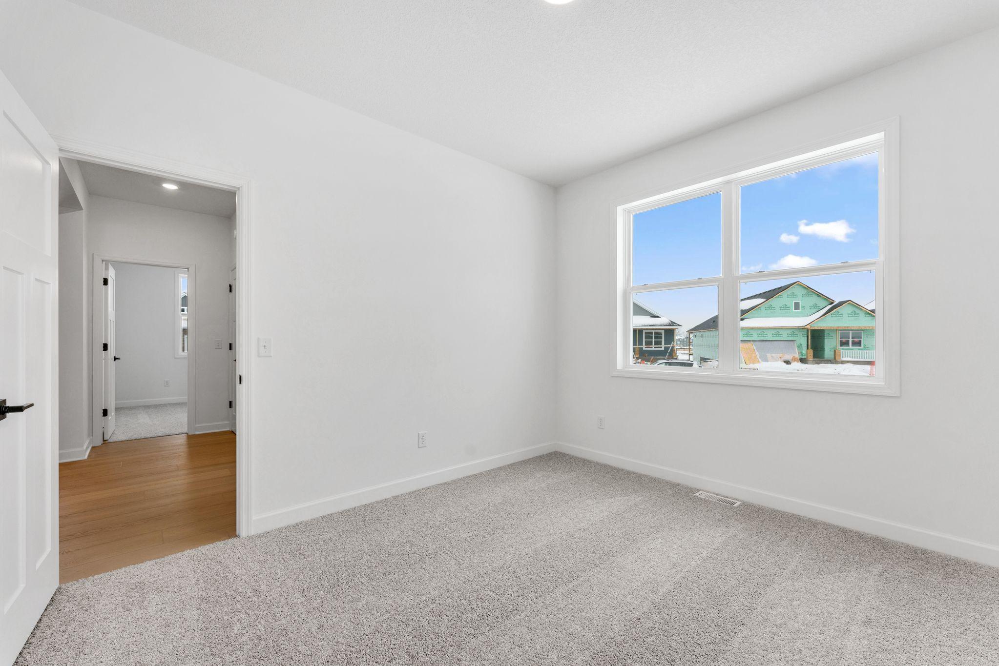 (Photo of a similar home, actual finishes may vary)